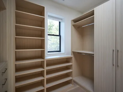 a view of a room that has a large window