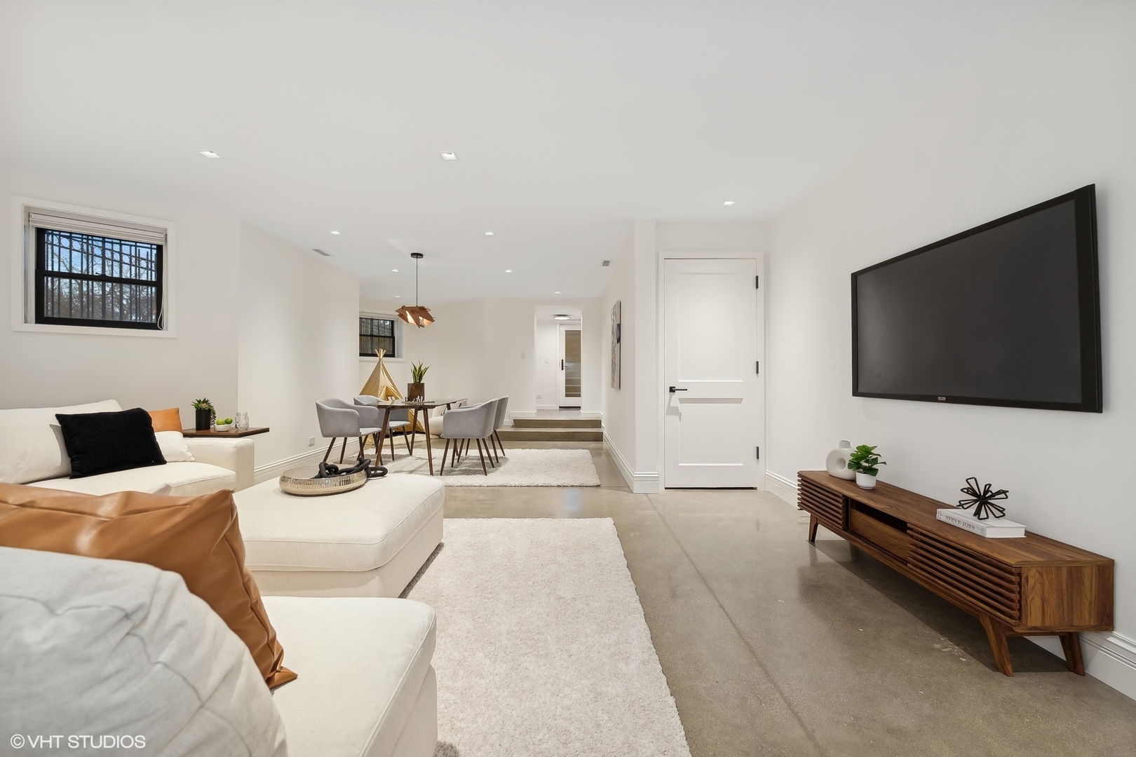 2039 North Humboldt Boulevard Chicago, IL 60647 - Photo 40 of 49 a living room with furniture and a flat screen tv