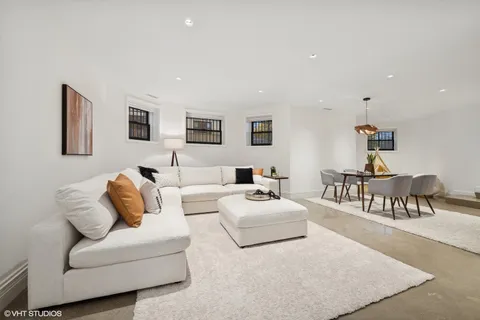 a bedroom with bed and window