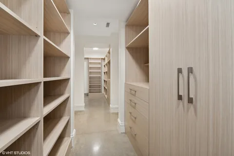 a bathroom with a sink and cabinets