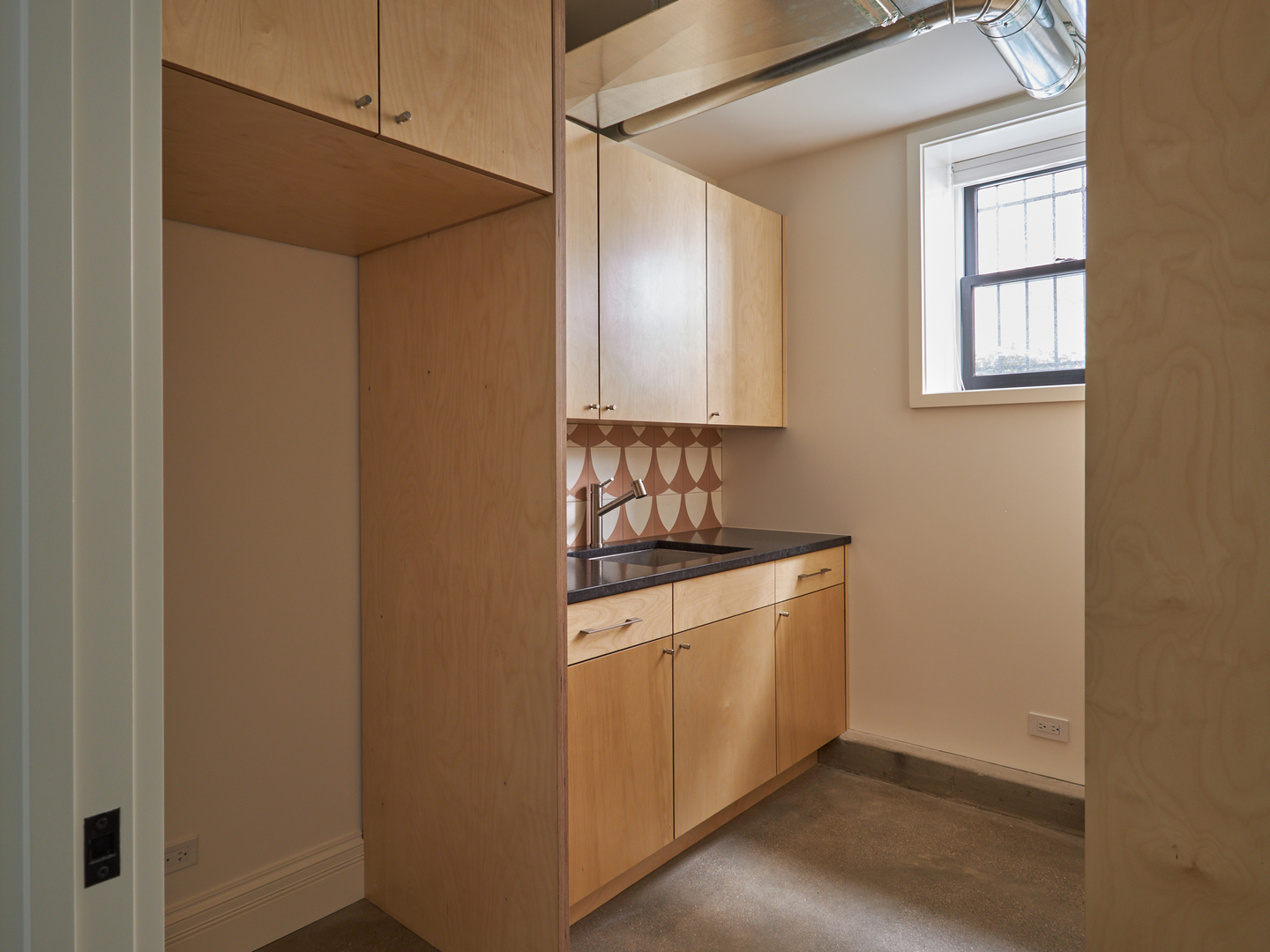 2039 North Humboldt Boulevard Chicago, IL 60647 - Photo 46 of 49 a kitchen with a sink a stove and cabinets
