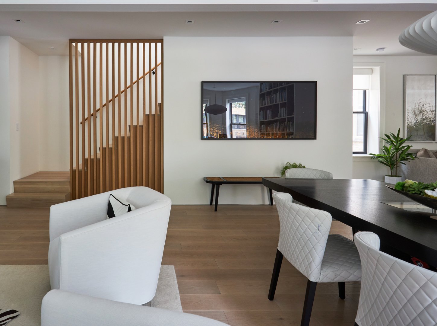 2039 North Humboldt Boulevard Chicago, IL 60647 - Photo 6 of 49 a living room with furniture and a potted plant