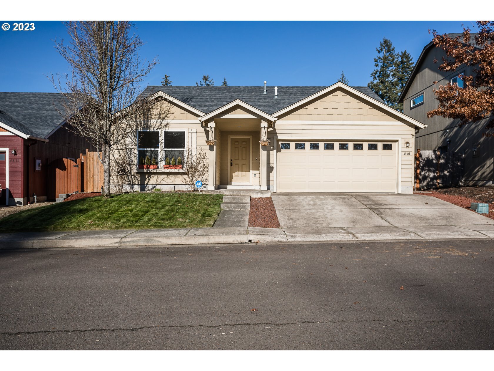 4840 Holly Street Springfield, OR 97478 - Photo 1 of 27 a view of a house with a yard and potted plants