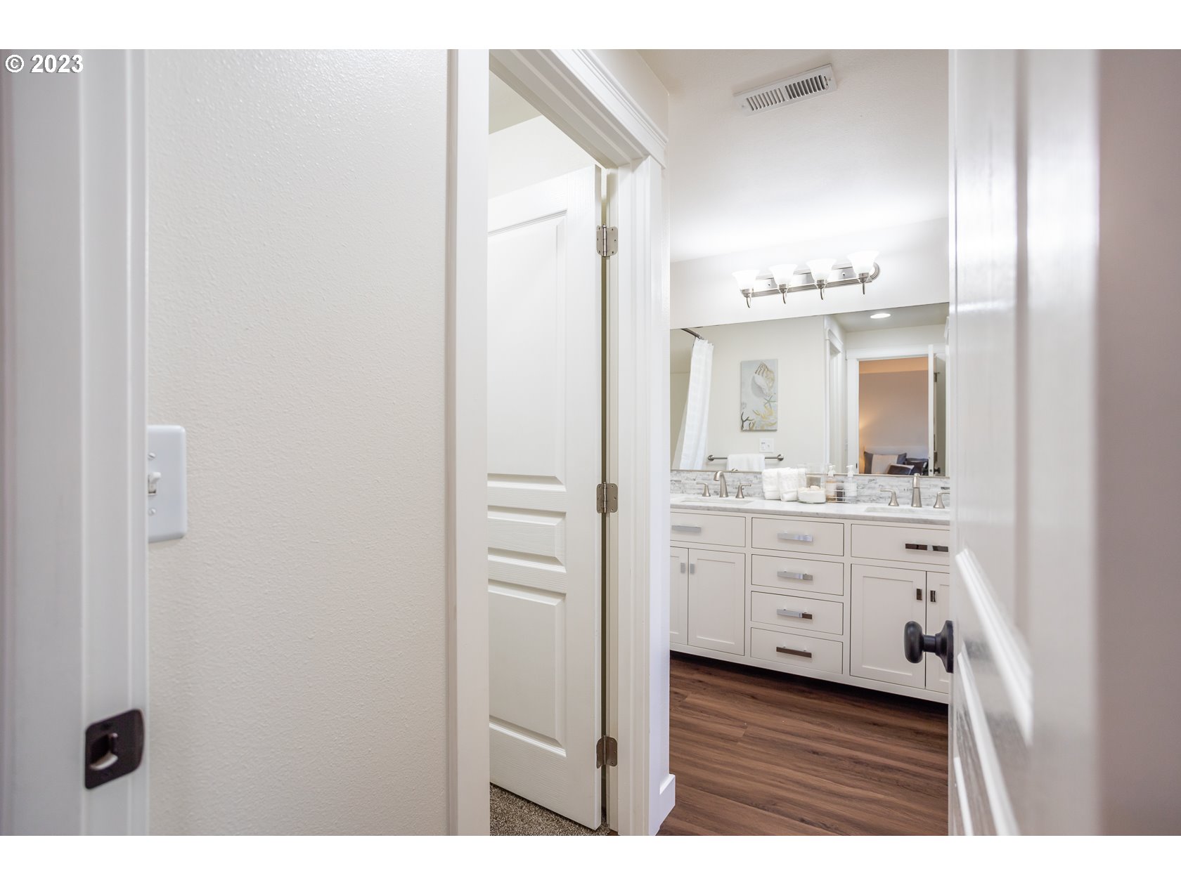 4840 Holly Street Springfield, OR 97478 - Photo 19 of 27 a bathroom with a double vanity sink mirror and