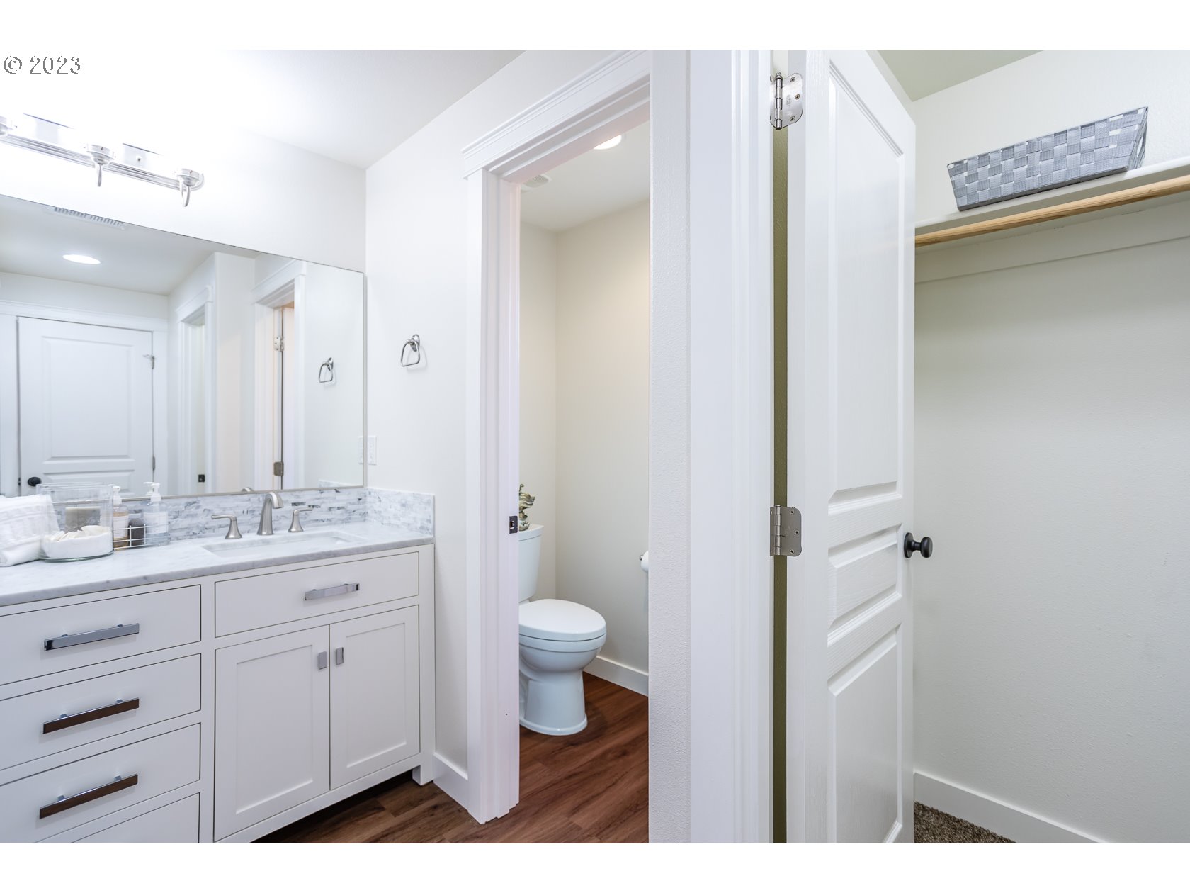 4840 Holly Street Springfield, OR 97478 - Photo 21 of 27 a bathroom with a granite countertop sink toilet and mirror