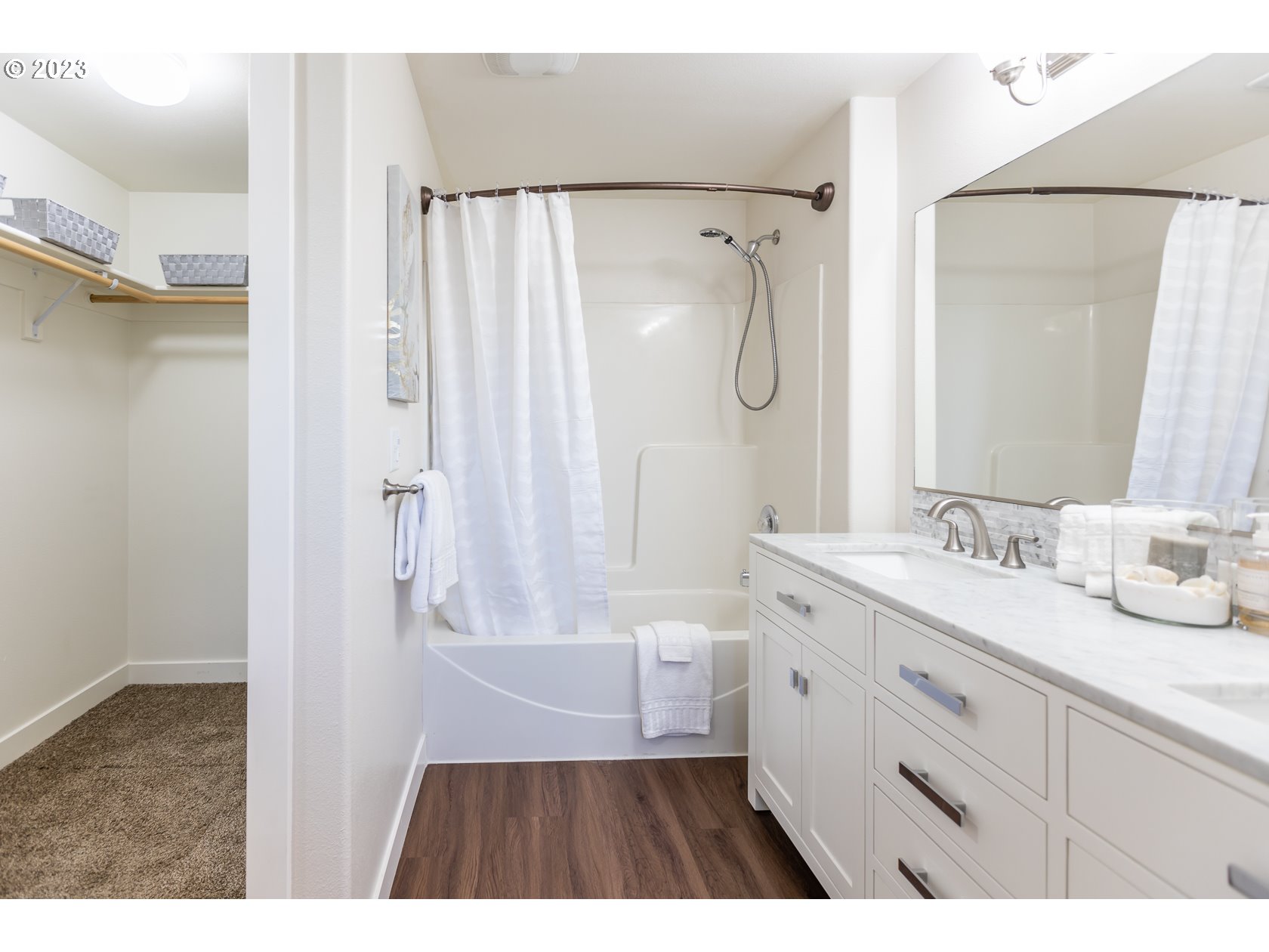4840 Holly Street Springfield, OR 97478 - Photo 22 of 27 a bathroom with a double vanity sink toilet double vanity and shower