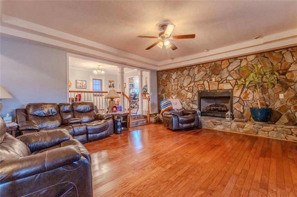 160 Highway 320 Carnesville, GA 30521 - Photo 6 of 68 a living room with furniture and a fireplace