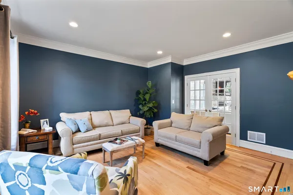 a living room with furniture and a couch