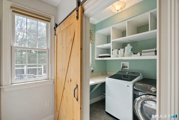 a storage room with washer and dryer