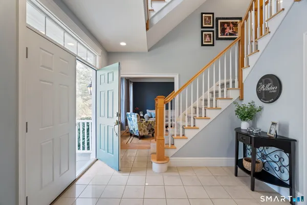 a view of entryway with stairs and furniture