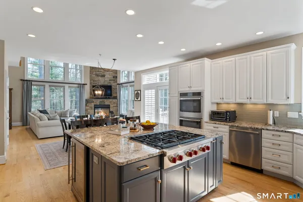 a kitchen with a stove and a sink