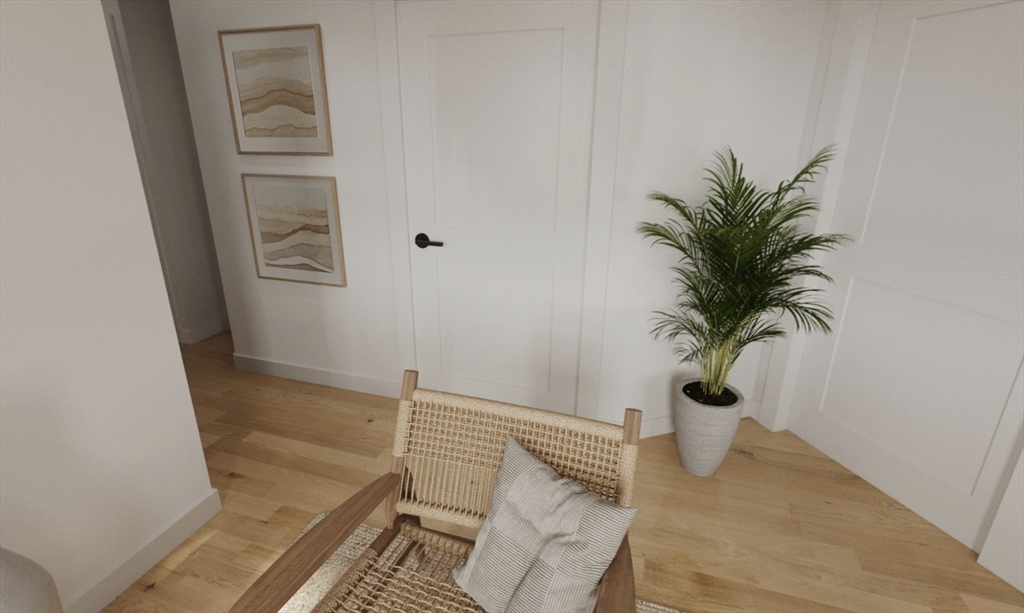 270 Talbot Avenue, Unit 302 Boston, MA 02124 - Photo 5 of 13 a view of small space with wooden floor