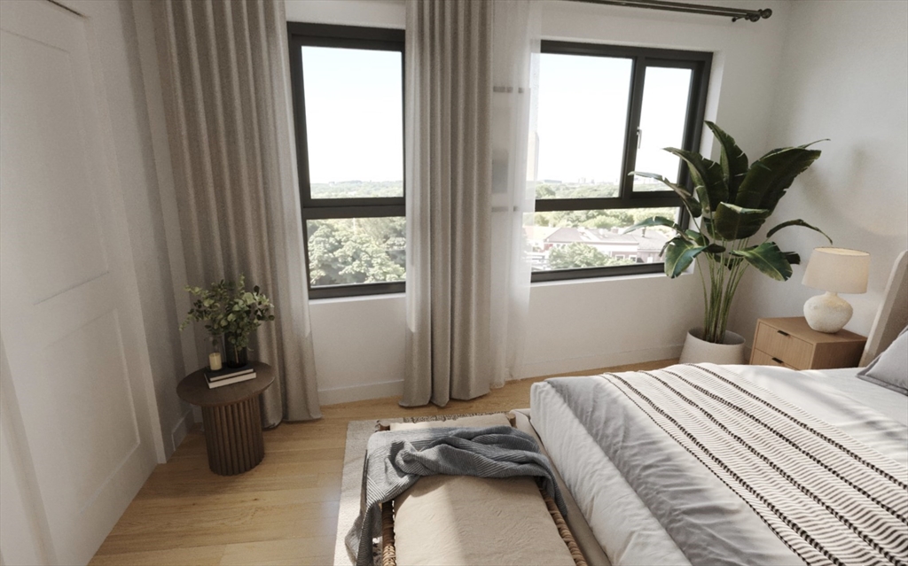 270 Talbot Avenue, Unit 302 Boston, MA 02124 - Photo 10 of 13 a bedroom with a bed and a window