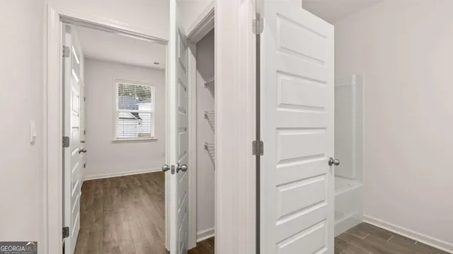 a view of a room with racks on the wall