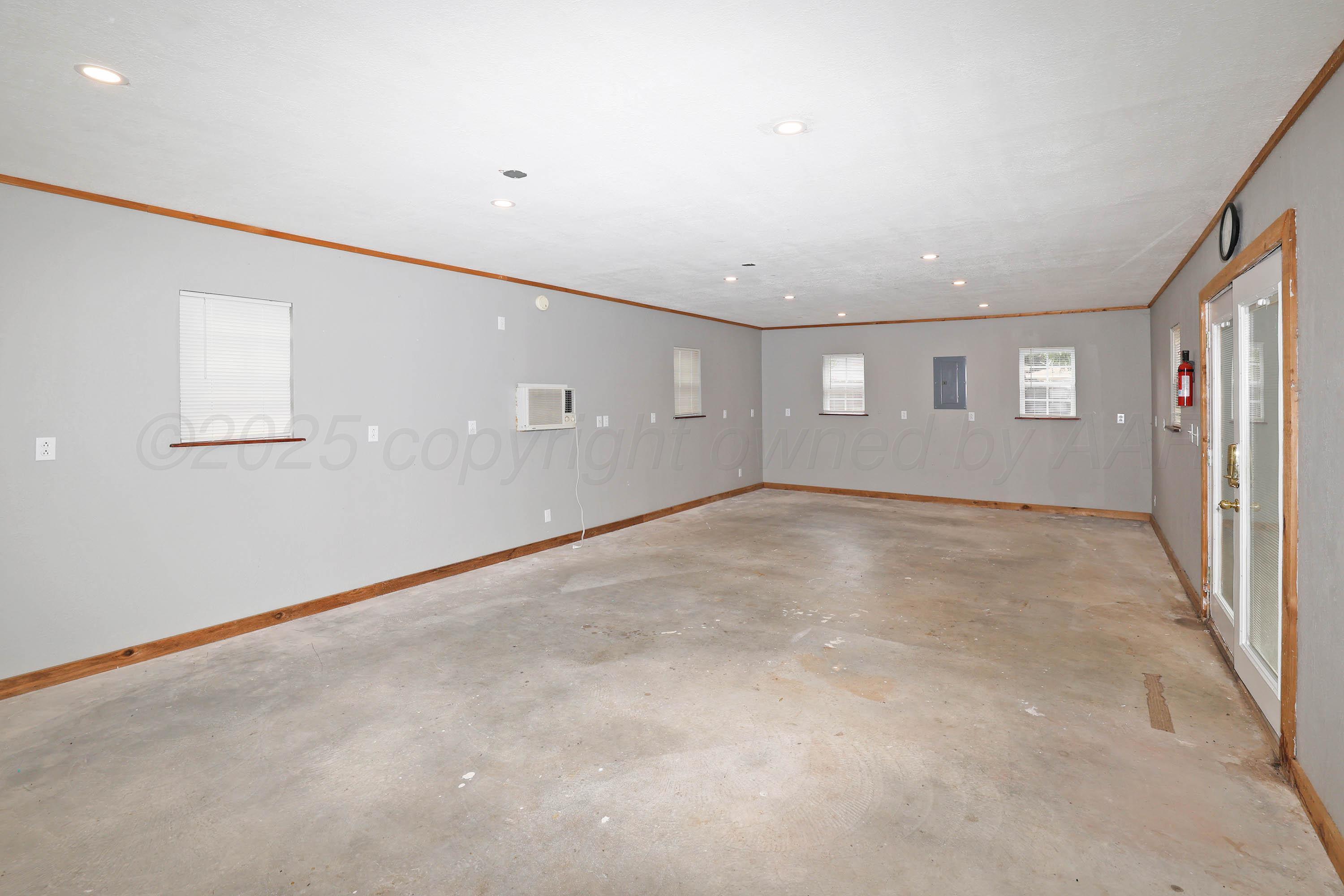 7426 Jameson Drive Amarillo, TX 79121 - Photo 38 of 38 an empty room with windows