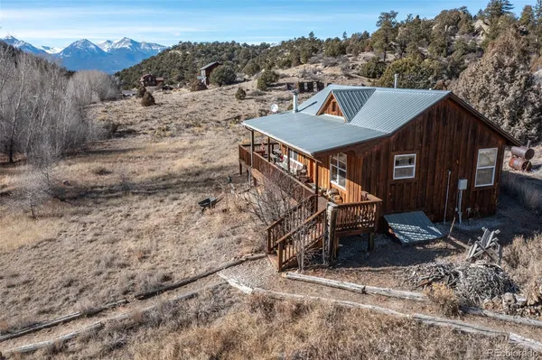 a terrace of a house with outdoor seating