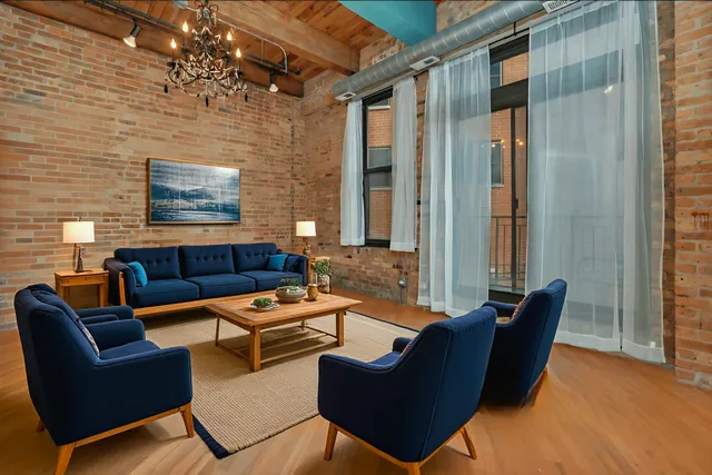 a outdoor living space with furniture and a potted plant