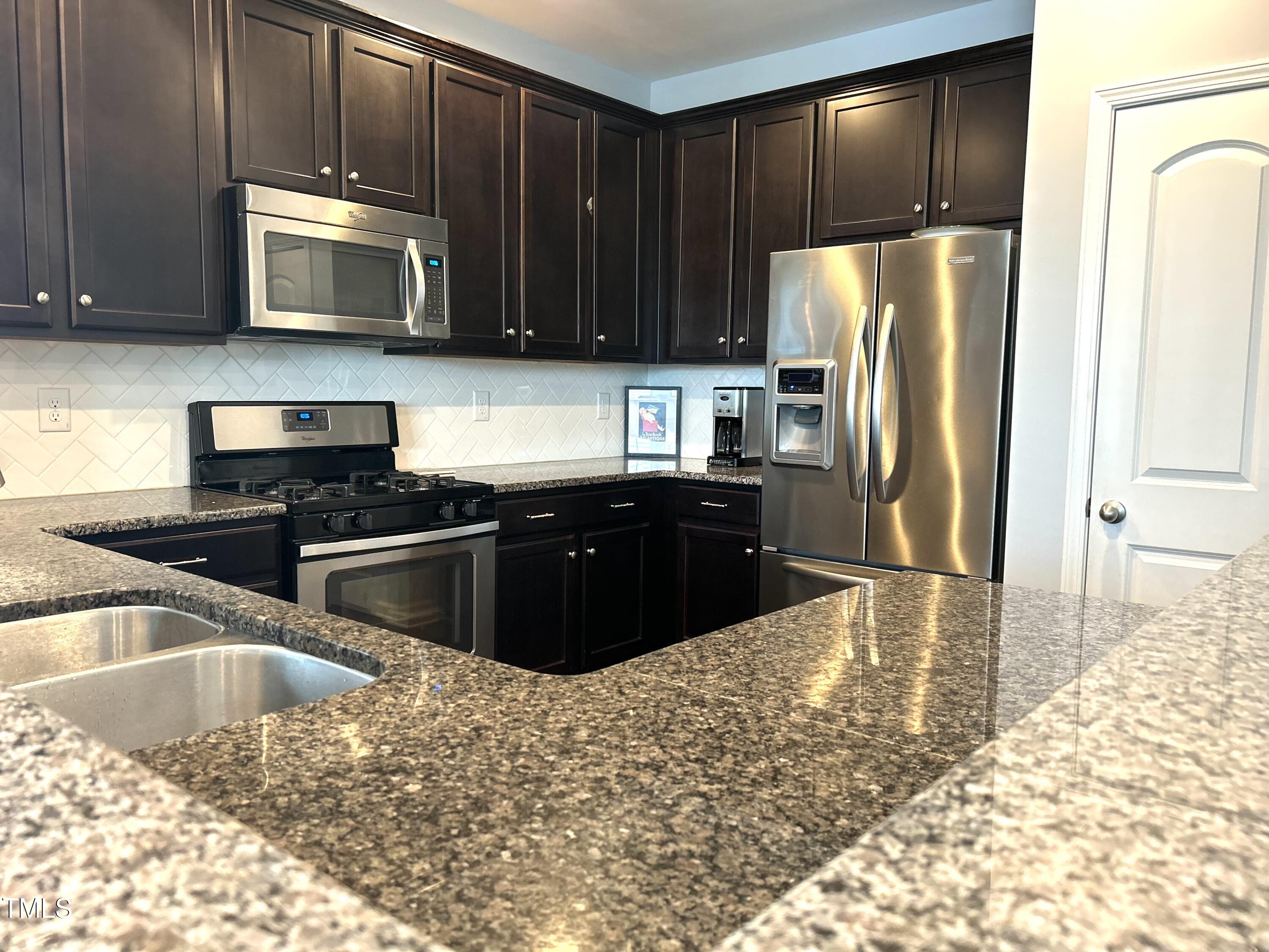 9128 Wooden Road Raleigh, NC 27617 - Photo 9 of 36 a-kitchen1