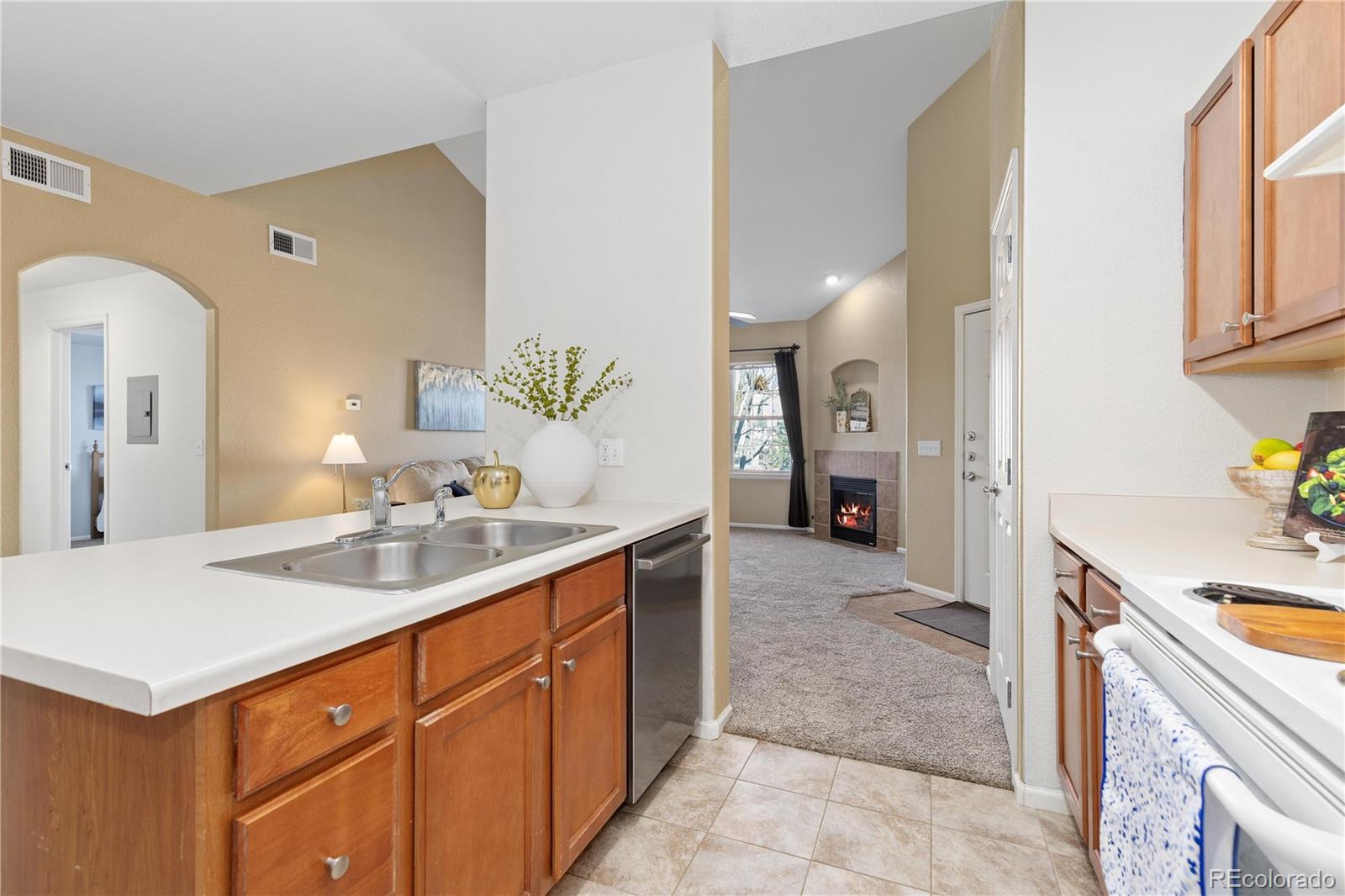 10841 Twenty Mile Road, Unit 206 Parker, CO 80134 - Photo 4 of 27 a spacious bathroom with a sink and a mirror