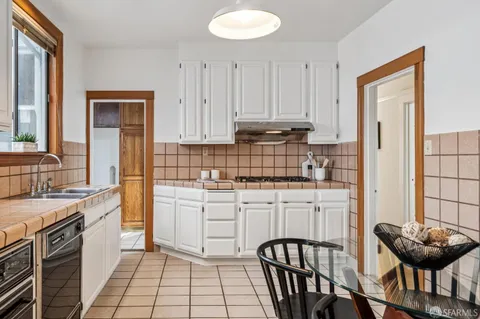 a bedroom with a bed and a mirror