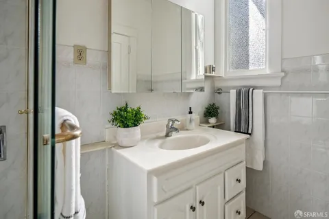 a bathroom with a bathtub and a toilet