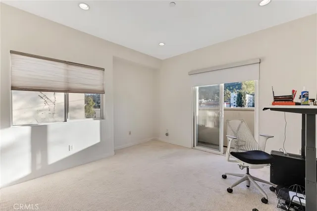 a room with furniture and a flat screen tv