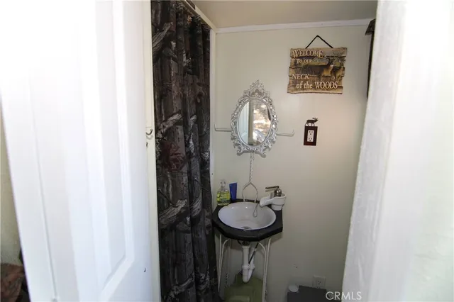 a view of balcony with furniture