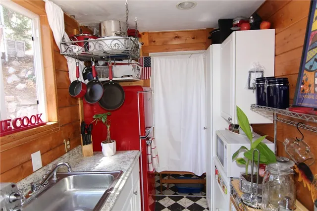 a store room with lots of fruit and furniture