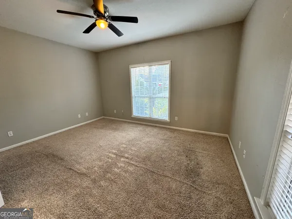 a bathroom with a sink vanity and a mirror