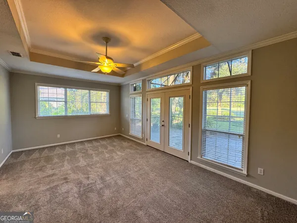 a view of a bathroom from a hallway