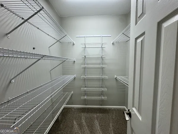 a view of small space with racks on the wall