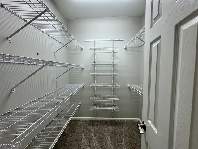 a view of small space with racks on the wall