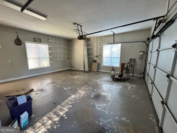 a view of a porch with potted plants