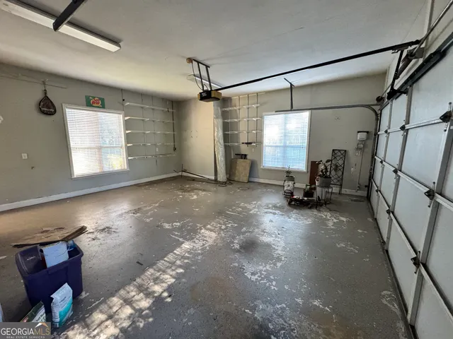 a view of a porch with potted plants