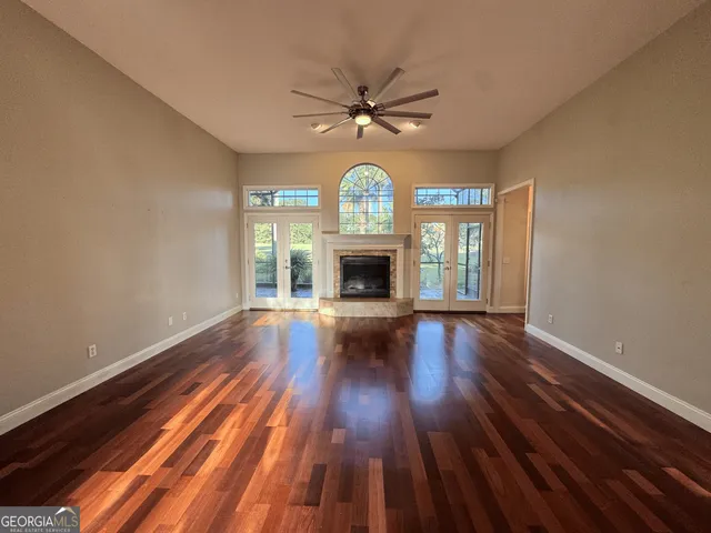 a view of kitchen and dining room with wooden floor