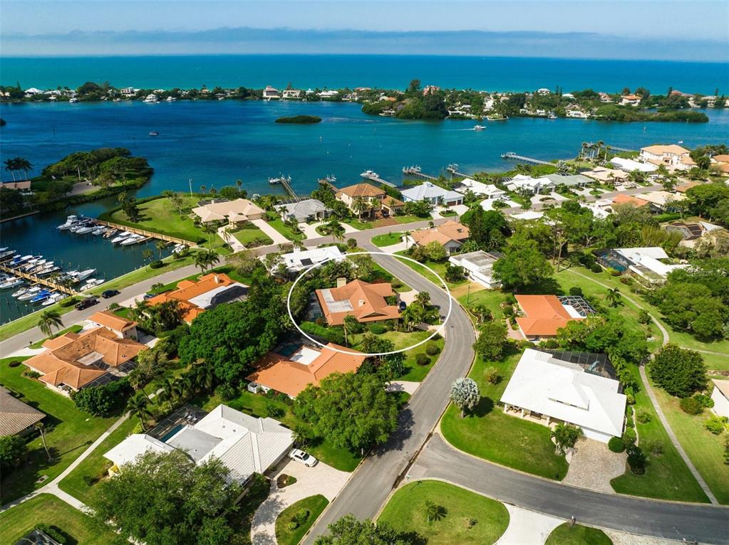 an aerial view of ocean residential houses with outdoor space and river