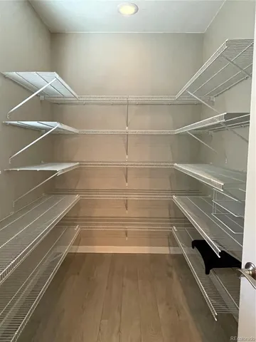 a view of a livingroom with wooden floor