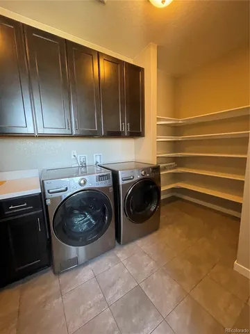 a kitchen with granite countertop stainless steel appliances and sink