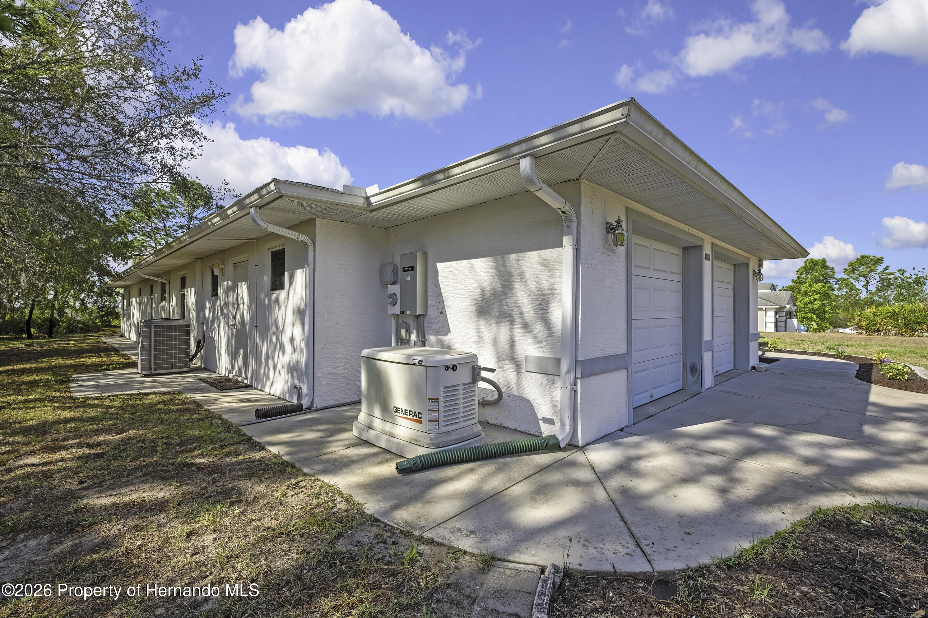 7250 Madrid Road Weeki Wachee, FL 34613 - Photo 51 of 63 Whole house compressor
