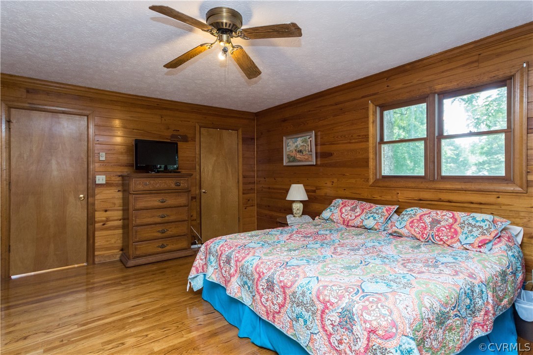 22 Foxes Tract Road West Point, VA 23181 - Photo 20 of 36 a bedroom with a bed and a flat screen tv