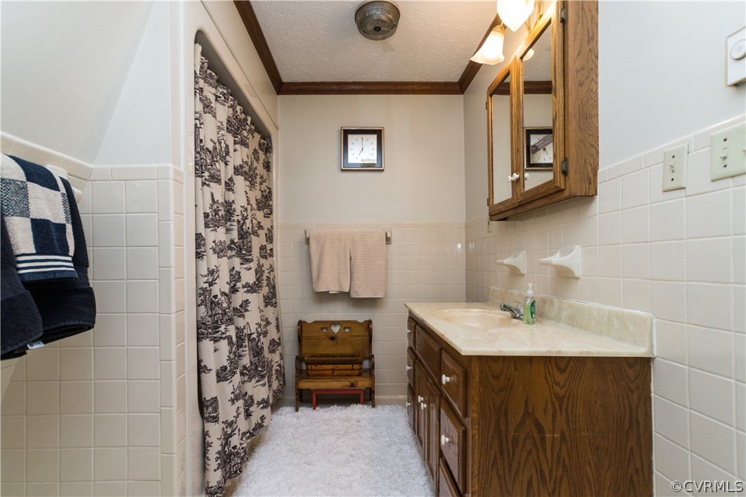 22 Foxes Tract Road West Point, VA 23181 - Photo 21 of 36 a bathroom with a sink and a mirror