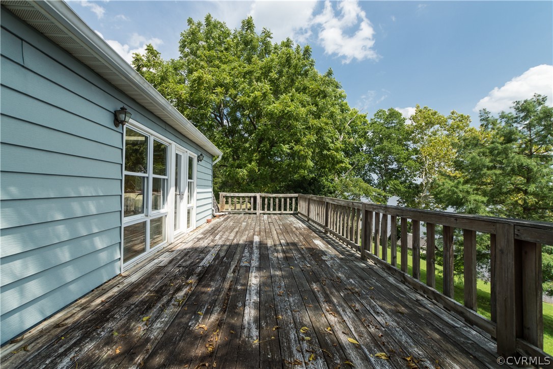 22 Foxes Tract Road West Point, VA 23181 - Photo 25 of 36 a view of balcony with wooden floor and fence