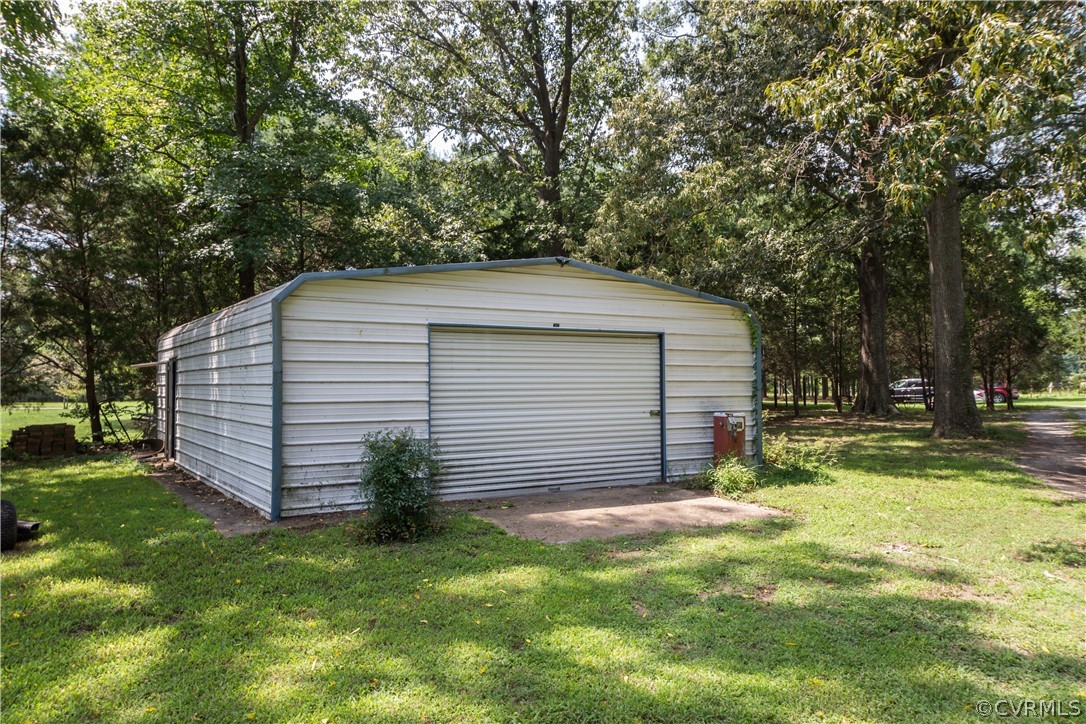 22 Foxes Tract Road West Point, VA 23181 - Photo 27 of 36 a view of a backyard with large tree