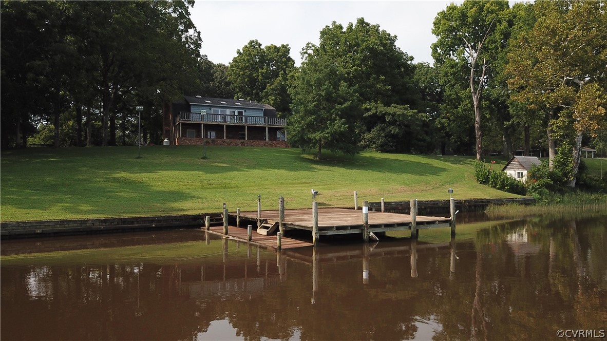 22 Foxes Tract Road West Point, VA 23181 - Photo 34 of 36 a view of a lake with houses