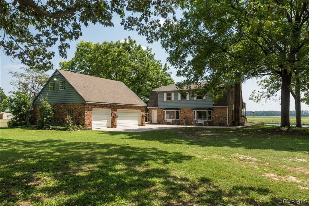 22 Foxes Tract Road West Point, VA 23181 - Photo 5 of 36 a front view of house with yard and green space