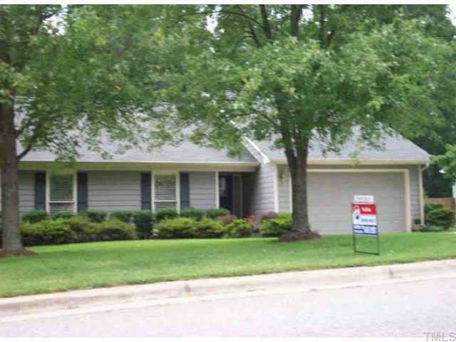 4513 Fox Road Raleigh, NC 27616 - Photo 1 of 1 a front view of a house with a garden and yard