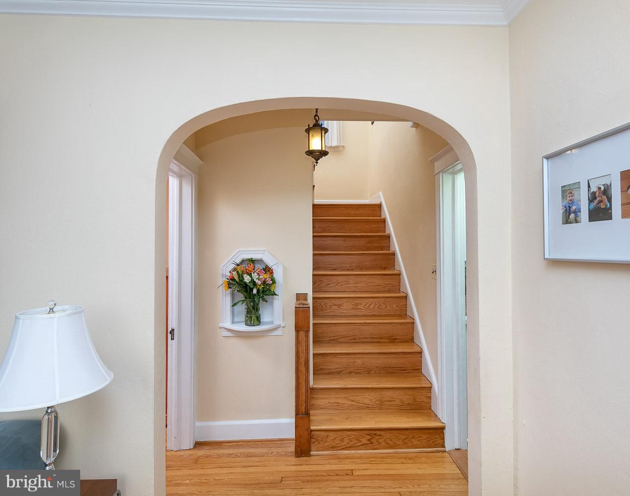 726 Anneslie Road Baltimore, MD 21212 - Photo 15 of 45 Arched doorways and wood floors.