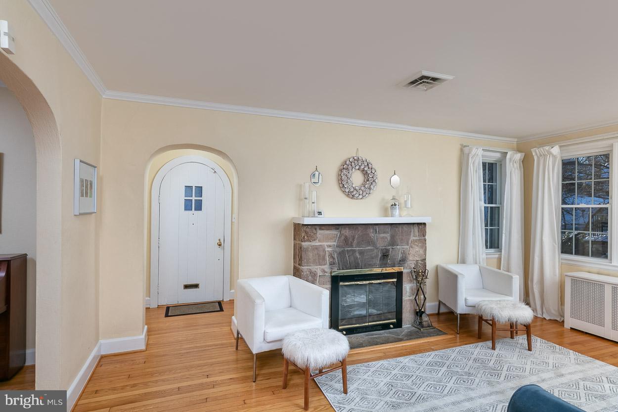 726 Anneslie Road Baltimore, MD 21212 - Photo 10 of 45 Cozy living room with wood burning fireplace.