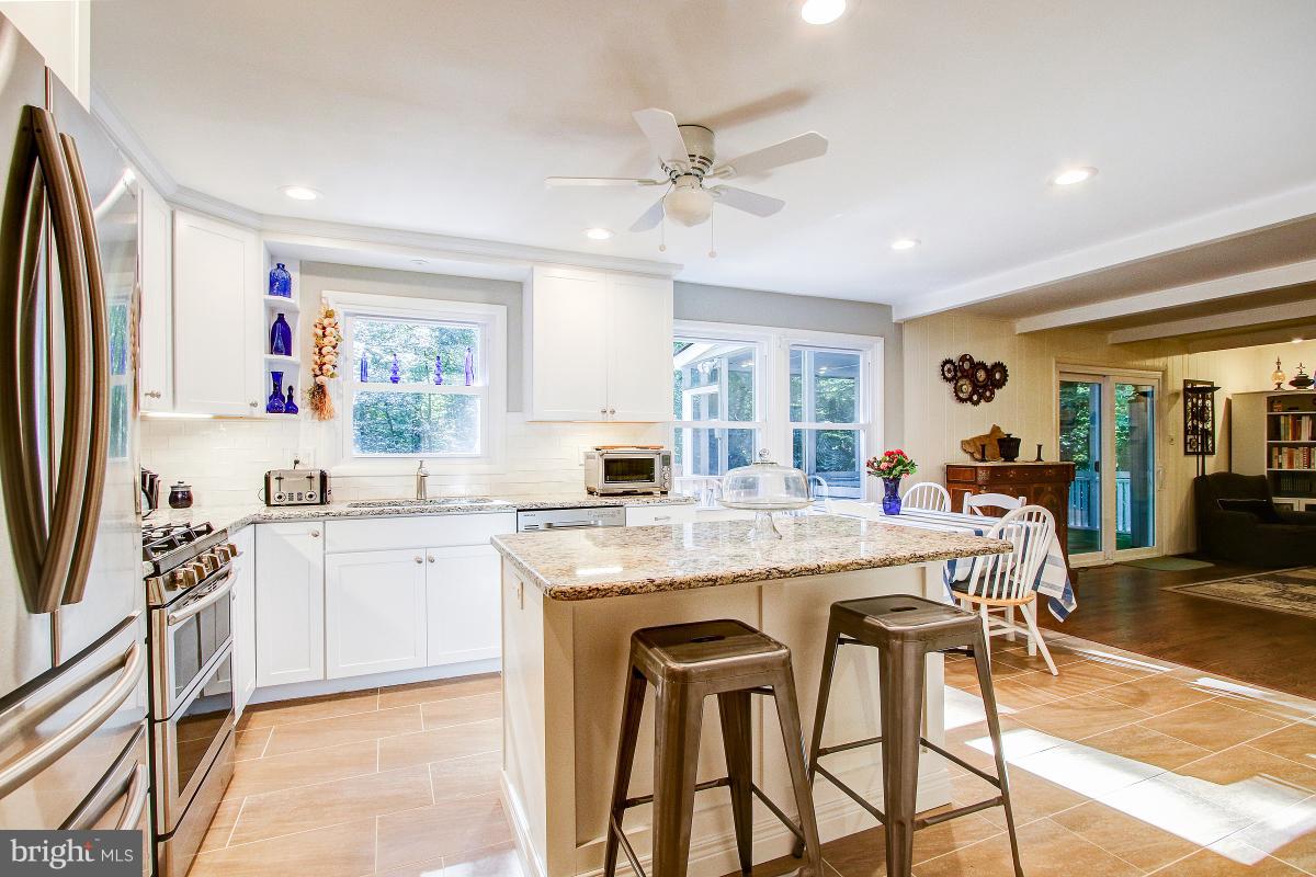 11413 Running Cedar Road Reston, VA 20191 - Photo 5 of 30 Remodeled Kitchen opens to Family Room and Deck