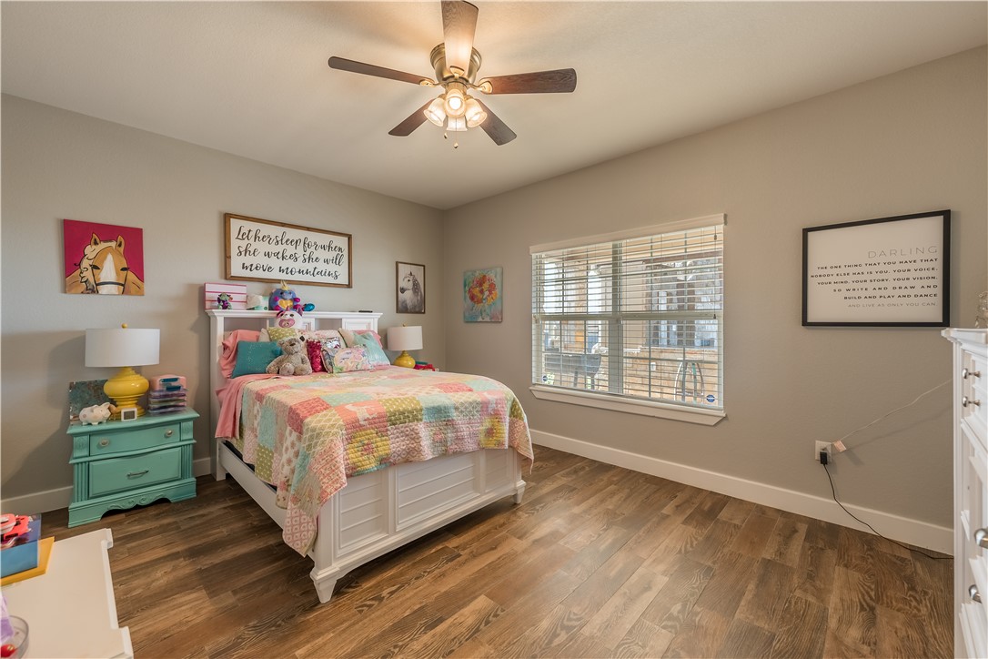 246 Patton Road Valley Mills, TX 76689 - Photo 10 of 20 a bedroom with a bed dresser and a window
